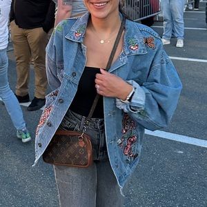 Worn once-  oversized denim jacket with patches